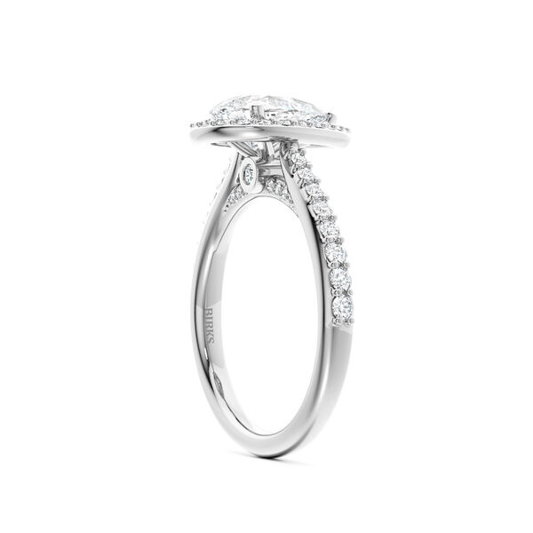 Platinum Pear-Cut Diamond Engagement Ring With Halo and Diamond Band